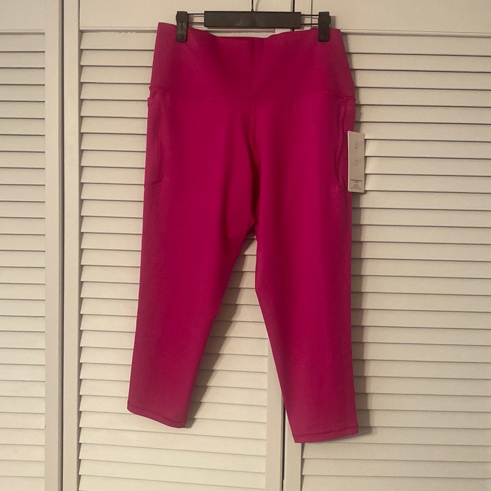 Athleta salutation stash pocket II 7/8 tight